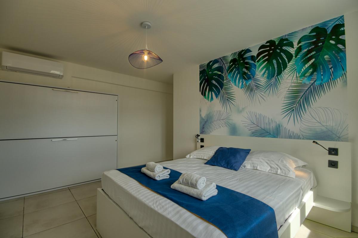 Location appartement luxe Trois Ilet Martinique - Suite parentale avec lits superposés encastrables
